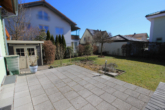 Terrasse - Charmante Doppelhaushälfte mit sonnigem Garten in familienfreundlicher Lage von Langenpreising